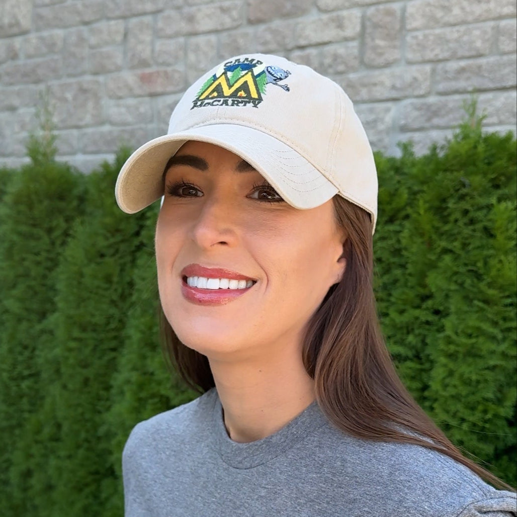 Stephanie wearing the Camp McCarty Dad Hat outside