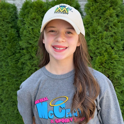 Audri wearing the Camp McCarty Dad Hat outside