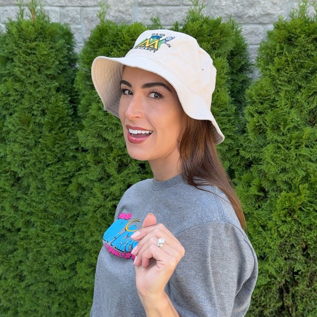 Stephanie wearing the Camp McCarty Bucket Hat outside