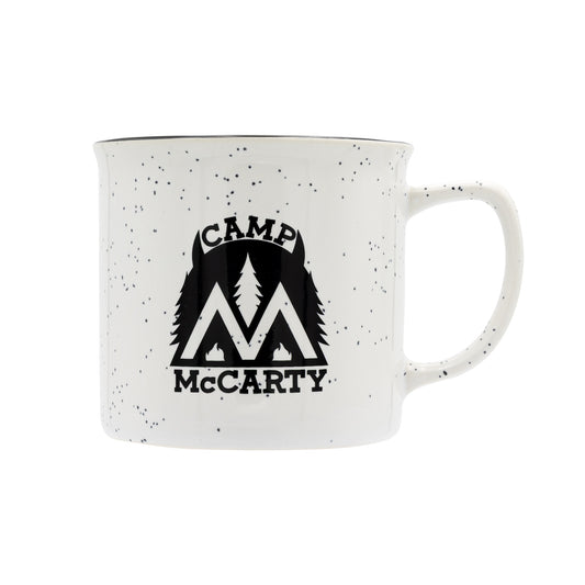 White mug with black speckles featuring 'Camp McCarty' logo on a white background
